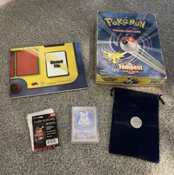 Pokemon Alakazam Base Set 2 Holo Card Tempest Game Mat Box & Pikachu Coin Bundle - Image 1
