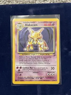 Pokemon Alakazam Base Set 2 Holo Card Tempest Game Mat Box & Pikachu Coin Bundle - Image 2