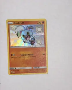 Pokemon TCG SM Hidden Fates - Rockruff Shiny Vault Holo SV23/SV94 - Image 1