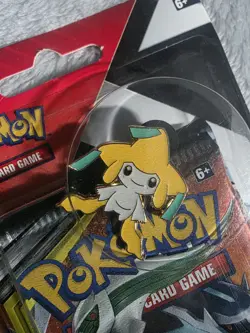 Pokemon Sun & Moon Cosmic Eclipse Booster Pack w/ Jirachi Pin Sealed English - Image 2