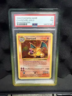 Pokemon 1999 Charizard Base Set Shadowless Holo Card #4 PSA 7 Near Mint - Image 1