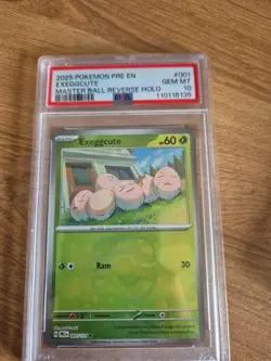 Pokemon TCG Exeggcute Card Prismatic Evolutions, 001/131 Masterball PSA 10 POP26 - Image 1