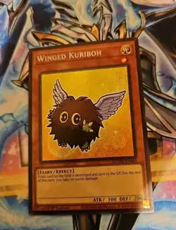 Yugioh Winged Kuriboh MZMU-EN064 Secret Rare 1st Edition NM - Image 1