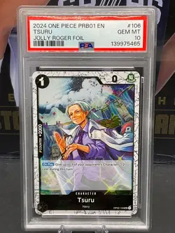 2024 One Piece PRB-01 English 106 Tsuru Jolly Roger Foil PSA 10 GEM MINT - Image 1