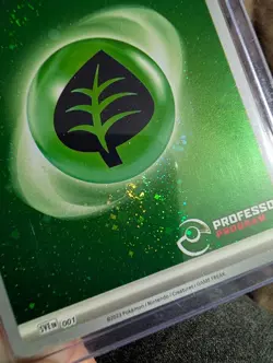 Pokemon Basic Grass Energy SVE 001 Professor Program 2023 Cosmos Holo 3 Swirls - Image 3