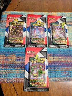 lot of 4 pokemon sword & shield evolving skies booster blister pin packs - Image 1
