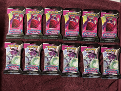 Pokemon TCG Sword & Shield Fusion Strike SLEEVED booster packs sealed lot of 12 - Image 1