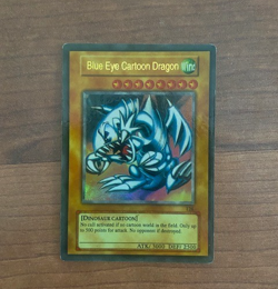 Blue Eye Cartoon Dragon Holo Fake Yugioh Card - Image 1