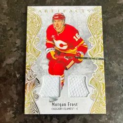 2025-26 Upper Deck Artifacts Jersey Gold #12 Morgan Frost /299 Calgary Flames - Image 1