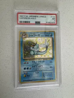 1997 Pokemon Japanese Jungle Vaporeon Holo #134 PSA 7 NM – Vintage WOTC - Image 1