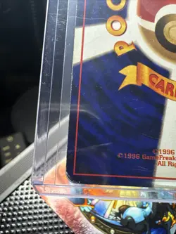 1997 Holo Japanese Dark Blastoise Pokemon Card with Swirl (Damaged)!! - Image 3