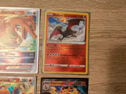 $57 Value Charizard Pokemon Card Lot - Charizard V, VStar, EX, and Radient - Image 4
