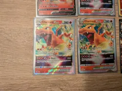 $57 Value Charizard Pokemon Card Lot - Charizard V, VStar, EX, and Radient - Image 5