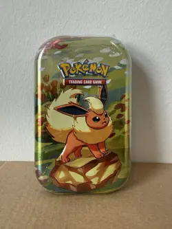 Pokemon TCG Scarlet & Violet Prismatic Evolutions Mini Tin Flareon NEW SEALED - Image 1