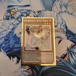 Yugioh Ash Blossom & Joyous Spring MAGO-EN011 Premium Gold Rare 1st Ed Alt Art - Image 1