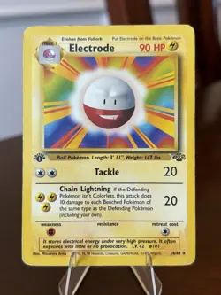 Electrode 18/64 - 1st Edition Jungle Error Misprint - Pokemon Card - Image 1