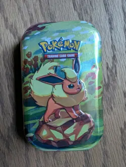 Pokemon TCG Scarlet Violet Prismatic Evolutions Flareon Mini Tin Sealed - Image 1
