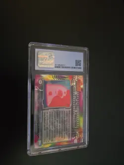 1999 Topps Mewtwo Strikes Back Stealing Pokemon #27 1st Print CGC 10 Pristine - Image 2