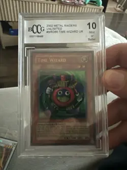 2002 Yu-Gi-Oh! Metal Raiders Unlimited Time Wizard MRD-065 Ultra Rare BCCG 10 - Image 1