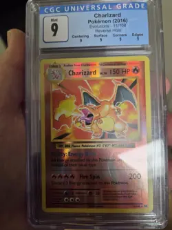 CGC 9 Mint 2016 Pokemon TCG Charizard Reverse Holo 11/108 XY Evolutions - Image 1