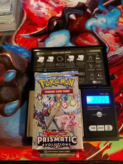 Pokemon Scarlet & Violet Prismatic Evolutions Sealed Booster Weighs 22.35 grams - Image 1