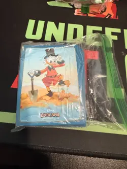 Lorcana Card Sleeves Scrooge TCG Disney Used Once - Image 1