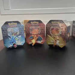 Pokemon Hidden Fates GX Tins- Art Set of 3 Sealed Charizard Raichu Gyarados Rare - Image 1