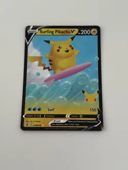 Pokemon TCG Surfing Pikachu v Celebrations Holo Ultra Rare Card 008/025 - Image 1