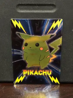 1999 Pokemon Meiji Promo Foil Japanese Embossed Pikachu - Image 1