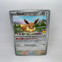 Eevee 074/131 Pokemon Day Cosmos Holo Promo Prismatic Evolutions - Image 1