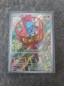 Pokemon TCG Riolu 010 Mega Evolution Black Star Promo Holo Card - Image 1