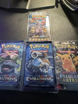 Pokemon Sealed Booster Pack Bundle x4 total. Evolutions,Paldean Fates + Mewtwo - Image 1