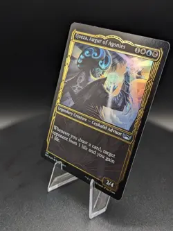 Queza, Augur of Agonies (Gilded Foil) Streets of New Capenna Foil - Image 3