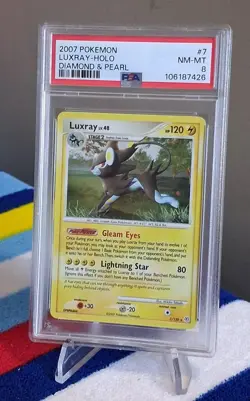 PSA 8 LUXRAY 7/130 | D&P Base Holo 2007 Graded Pokemon Card - Image 1