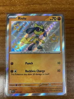 Pokemon TCG SV: Paldean Fates Riolu 173/091 Baby Shiny NM - Image 1