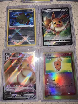 Pokemon TCG 4 Card Lot Radiant Jirachi Eevee V Eevee VMAX Torchic Holo Foil - Image 1