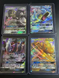 Pokemon GX Holo Card Lot - Gyarados, Melmetal, Darkrai, Dragonite - Image 1