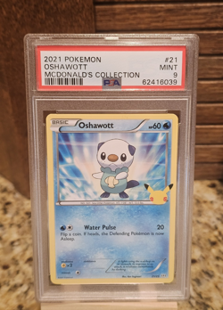 Pokemon McDonald's Collection Oshawott 21/25 PSA 9 Basic Stage EN - Image 1