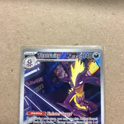 Toxtricity 103/094 ME02: Phantasmal Flames Illustration Rare Pokemon Card - Image 3