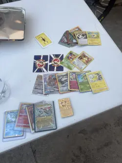 Pokemon TCG Mixed Card Lot with Tins, Binder, Pikachu, Meowth, Squirtle - Image 1