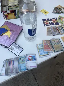 Pokemon TCG Mixed Card Lot with Tins, Binder, Pikachu, Meowth, Squirtle - Image 2