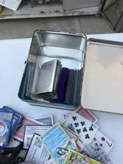 Pokemon TCG Mixed Card Lot with Tins, Binder, Pikachu, Meowth, Squirtle - Image 5