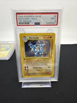PSA 9 MINT Machamp 8/102 1st Edition Base Set Holo Rare Pokemon Card - Image 1