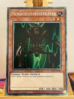 Menschenfresserkafer RA03-DE082 Platinum Secret Rare Deutsch NM YUGIOH - Image 1