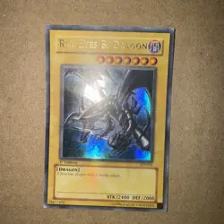 Yugioh Red-Eyes Black Dragon SDJ-001 1st Edition Ultra Rare HP big crease - Image 1