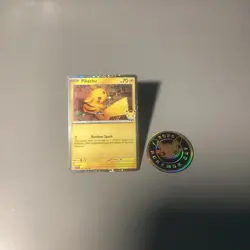 Pokemon Pikachu 051/162 Promo Stamped Cosmos Holo Card and Pokemon Day 2026 Coin - Image 1