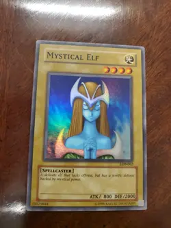 🔥 YuGiOh Mystical Elf LOB-EN062 LEGEND OF BLUE-EYES SET SUPER RARE NEAR MINT - Image 1