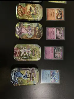 Pokemon Prismatic Evolutions Mini Tins + Costco Promo Cards Set of 8 empty tins - Image 2