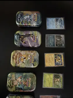 Pokemon Prismatic Evolutions Mini Tins + Costco Promo Cards Set of 8 empty tins - Image 3