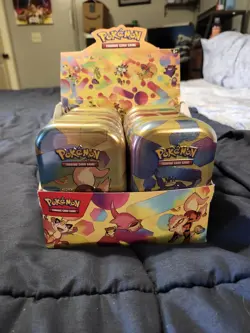 Pokemon 151 TCG Collectible Tin Box Set of 10 in display - Image 1